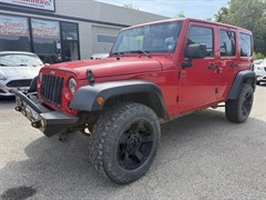 A 2016 Jeep Wrangler Unlimited SPORT