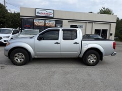 A 2010 Nissan Frontier CREW CAB SE