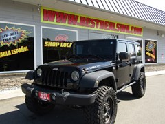 A 2015 Jeep Wrangler Unlimited SPORT