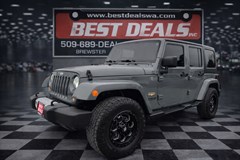 A 2015 Jeep Wrangler Unlimited SAHARA -IN BREWSTER-
