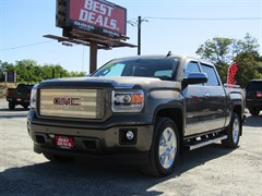 A 2015 GMC Sierra K1500 CREW CAB SLT -IN BREWSTER-