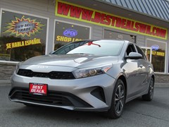 A 2024 Kia Forte LSX -IN OMAK-