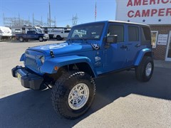 A 2014 Jeep Wrangler Unlimited FREEDOM
