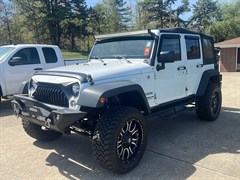 A 2015 Jeep Wrangler Unlimited SPORT