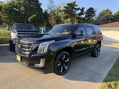 A 2015 Cadillac Escalade PLATINUM SPORT