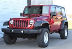 A 2012 Jeep Wrangler Unlimited SPORT
