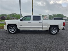 A 2015 Chevrolet Silverado C1500 HIGH COUNTRY