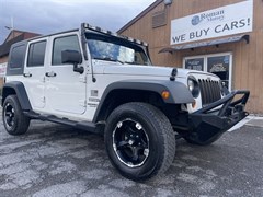 A 2010 Jeep Wrangler Unlimited SPORT