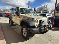 A 2011 Jeep Wrangler Unlimited SPORT